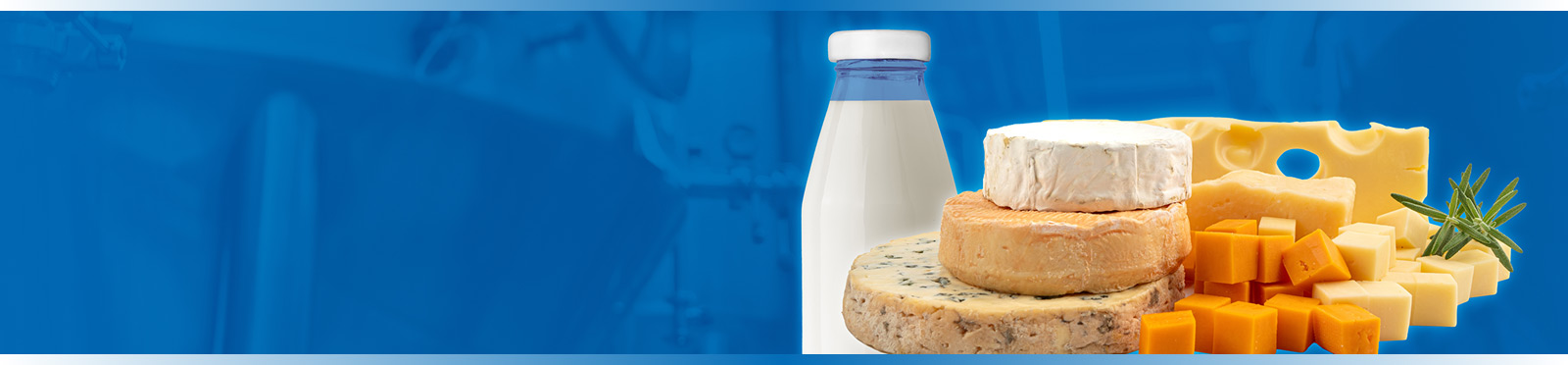 A stack of cheeses and a container of milk