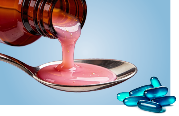 Medicine being poured into a spoon the background with some gel caps in the foreground