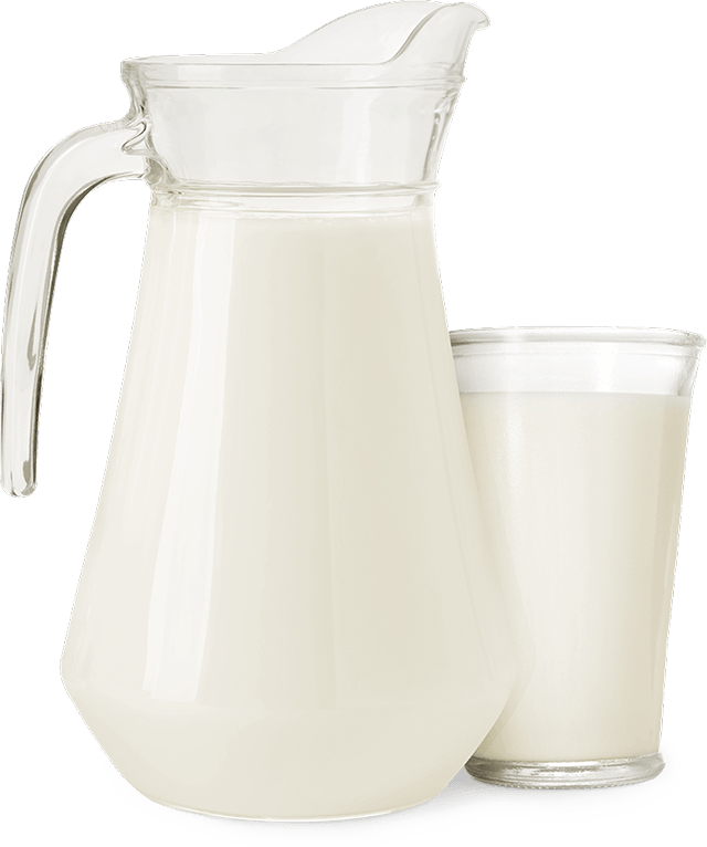 A pitcher and glass of milk
