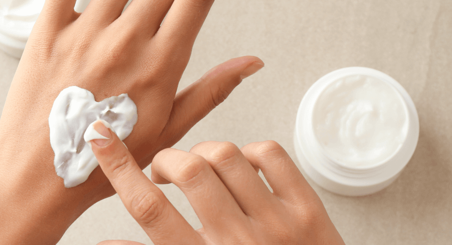 Lotion being rubbed into a hand